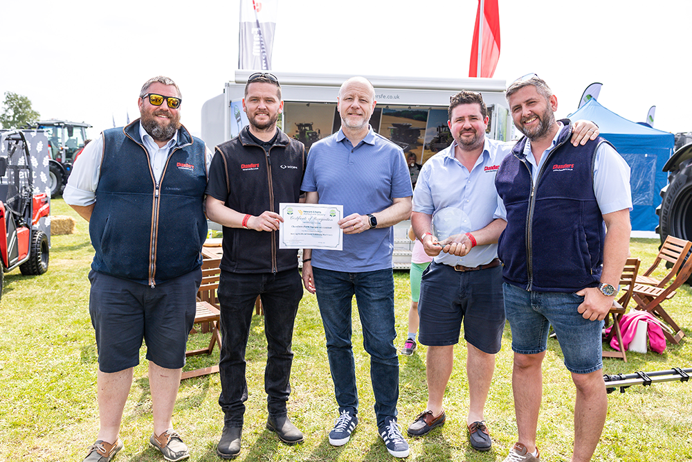 Alistair Millar from Tallents Solicitors presents the award for Best Agricultural Stand for Exhibiting Machinery to Chandlers (Farm Equipment) Ltd at the Nottinghamshire County Show 2026